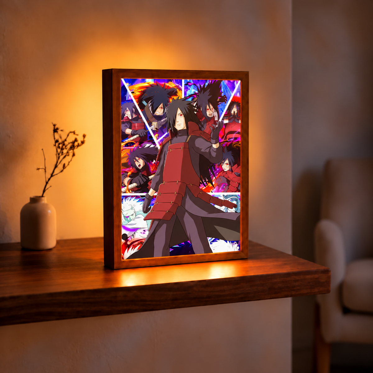 Madara Legacy illuminated art in a wooden frame on a table beside a vase in a warm room