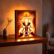 Naruto & Minato golden illuminated art in a wooden frame on a table beside a vase in a warm room