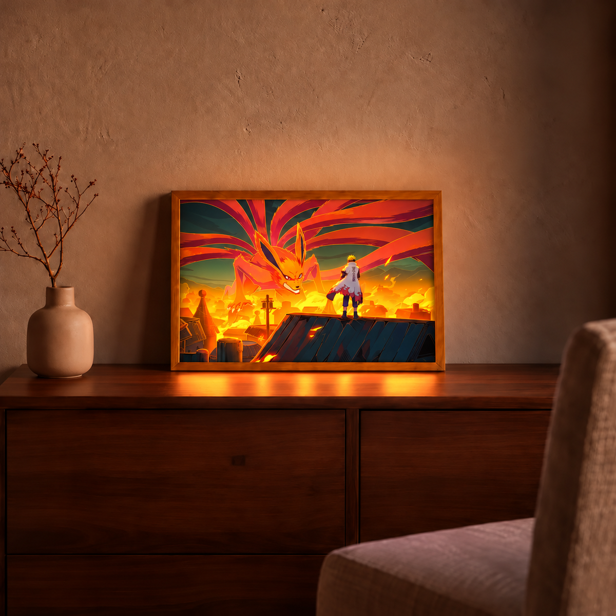 Nine-Tails Invasion illuminated art in a wooden frame on a cabinet with an orange glow in a warm room