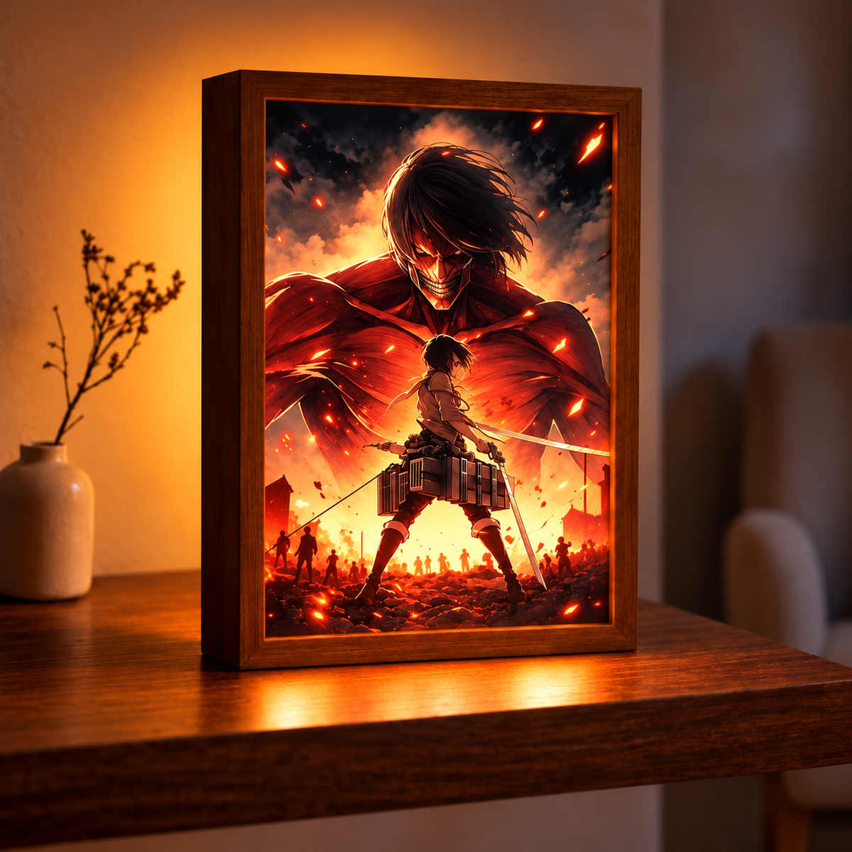 Titan Awakening illuminated artwork in a dark wooden frame on a table beside a ceramic vase, glowing with warm orange battle-scene light